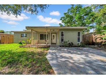 Charming single-story home with a covered porch and well-maintained front yard at 8537 93Rd Ave, Seminole, FL 33777