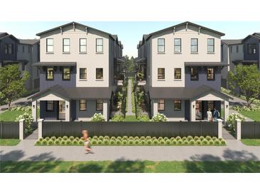 Modern townhome showcasing a neutral palette, welcoming front porches, and manicured landscaping at 3005 1St N Ave, St Petersburg, FL 33713