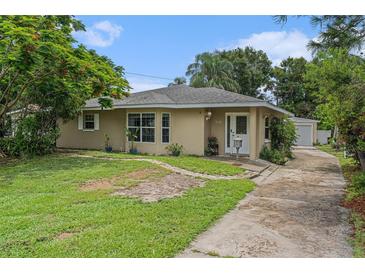 Charming single-story home with a well-maintained lawn and a welcoming front entrance at 1533 Suffolk N St, St Petersburg, FL 33710