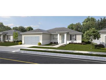 Charming one-story home with a two-car garage, landscaped yard, and welcoming entryway at 2204 S Biscayne Dr, North Port, FL 34287