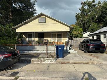 Charming single-story home with covered front porch and driveway parking at 2909 N 11Th St, Tampa, FL 33605