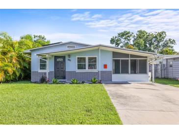 Charming single-story home with a well-maintained lawn and welcoming curb appeal at 487 49Th N Ave, St Petersburg, FL 33703