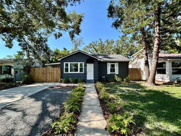 Charming home with a well-maintained front yard and walkway at 3018 11Th N Ave, St Petersburg, FL 33713
