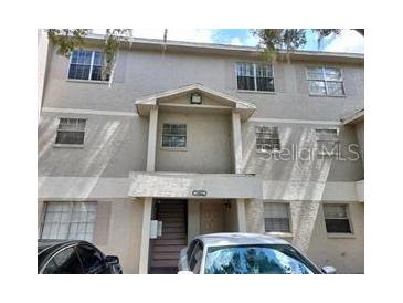 Multi-level condo building featuring multiple windows offering lots of natural light at 14442 Reuter Strasse Cir # 812, Tampa, FL 33613