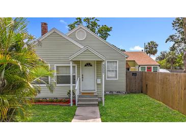 Charming single-story home with a well-manicured lawn and inviting front entrance at 3327 25Th N St, St Petersburg, FL 33713