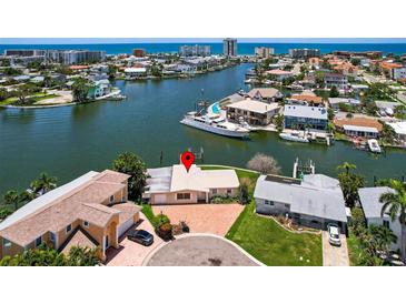 Waterfront home with boat dock and scenic views of the water and neighboring community at 17444 2Nd E St, Redington Shores, FL 33708