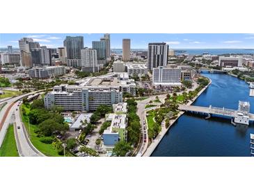 Scenic aerial view of the waterfront property with downtown skyline views and river access at 201 W Laurel St # 308, Tampa, FL 33602