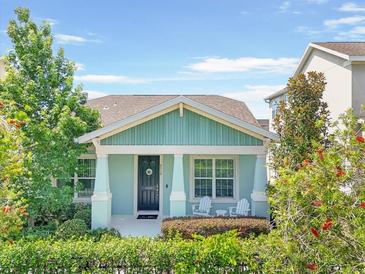 Charming single-Gathering home with a welcoming front porch and well-maintained landscaping at 6519 Watson Rd, Riverview, FL 33578