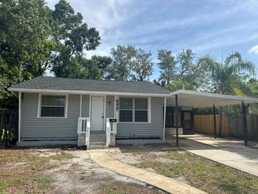 Charming one-story home featuring a covered carport and well-maintained landscaping at 6427 2Nd S Ave, St Petersburg, FL 33707