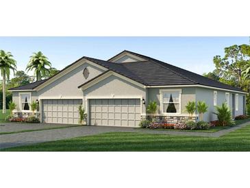Charming single-story home featuring a two-car garage, dark roof, stone accents, and well-maintained landscaping at 31442 Paper Birch St, Wesley Chapel, FL 33545