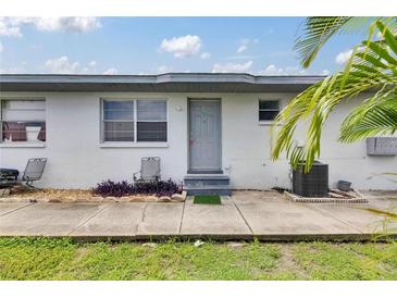 Charming single-story home with a well-maintained exterior and a small landscaped area at 1049 Apollo Beach Blvd # D, Apollo Beach, FL 33572