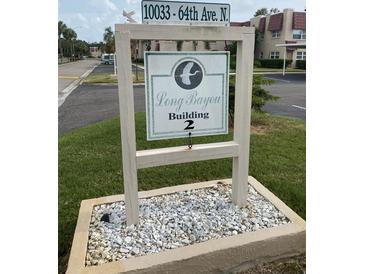 Photo of building sign for Long Bayou Building 2 at 10033 64Th N Ave # 1, St Petersburg, FL 33708