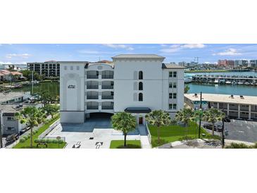 Modern condo building with waterfront views and parking at 211 Dolphin Pt # 501, Clearwater, FL 33767