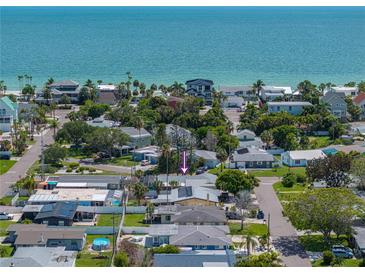Aerial view of a house near the beach, offering a view of the surrounding area at 16003 2Nd E St, Redington Beach, FL 33708