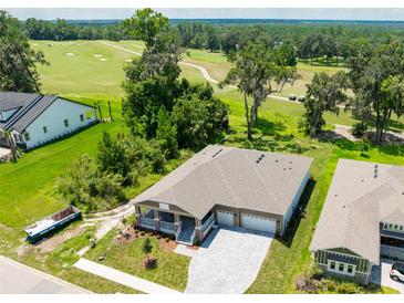 Single-Gathering home with golf course views and a two car garage at 6436 Summit View Dr, Brooksville, FL 34601