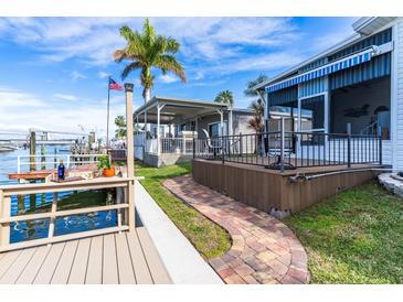 Enjoy waterfront views from this expansive patio at 18675 Us Highway 19 N # 377, Clearwater, FL 33764