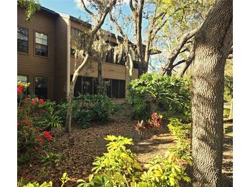 Charming condo nestled among mature trees and lush landscaping at 103 Cypress Pond Rd # 103, Palm Harbor, FL 34683