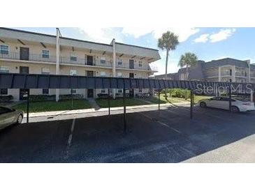 Two-story apartment building with covered parking at 8693 Bardmoor Blvd # 207B, Seminole, FL 33777