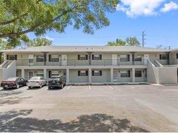 Front view of a two-story building with parking at 101 Lake Ne Ave # 225, Largo, FL 33771