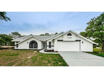 Photo one of 11326 Outrigger Ave Spring Hill FL 34608 | MLS U8236288