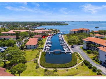 Aerial view of waterfront property with boat slips and canal access at 1801 Mariner Dr # 20, Tarpon Springs, FL 34689