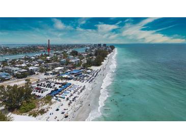 Aerial view showing home's location near the beach at 131 E Bay Dr, Treasure Island, FL 33706