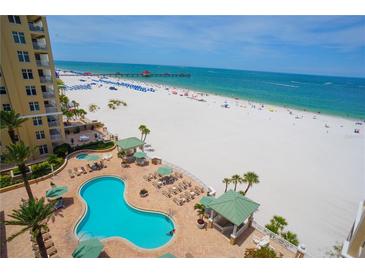 Aerial view of resort pool and beach access at 11 San Marco St # 903, Clearwater, FL 33767