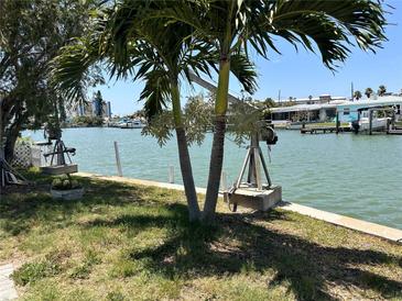 Private boat lift with waterfront access at 14845 N Bayshore Dr, Madeira Beach, FL 33708