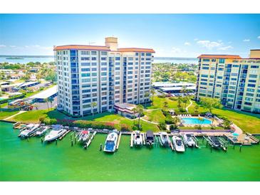 Luxury waterfront community with boat docks and a swimming pool at 736 Island Way # 404, Clearwater Beach, FL 33767