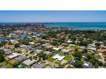Aerial view of a single-Gathering home with a large backyard, located in a residential neighborhood at 3931 38Th S Way, St Petersburg, FL 33711