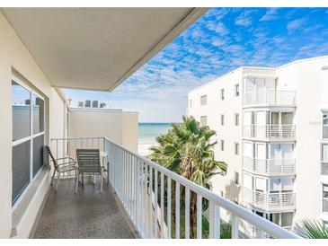 Ocean view balcony with patio furniture at 19610 Gulf Blvd # 409, Indian Shores, FL 33785