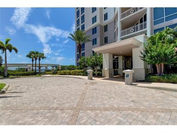 Luxury high-rise building with courtyard and gated entrance at 331 Cleveland St # 317, Clearwater, FL 33755