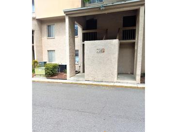 Building entrance with address number 7505 at 7505 Pitch Pine Cir # 123, Tampa, FL 33617