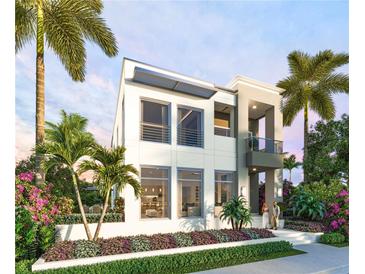 Modern two-story home with sleek design and landscaping at 5701 Bowen Daniel Dr. # 1 Villa, Tampa, FL 33616