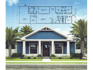 Two-story home with blue exterior, white columns, and front porch at 241 5Th N Ave, Safety Harbor, FL 34695