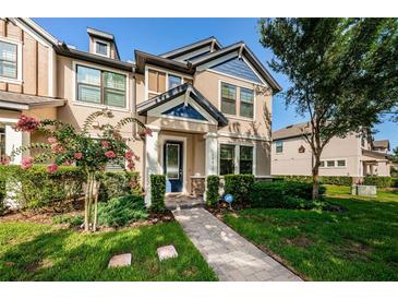 Two-story home with neutral tones and landscaping at 12610 Rangeland Blvd, Odessa, FL 33556