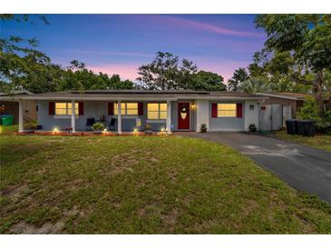 Single-story home with updated facade and landscaping at 10837 109Th N St, Seminole, FL 33778