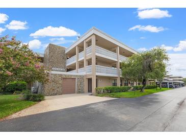 Building exterior of condo with parking at 5080 Locust Ne St # 329, St Petersburg, FL 33703