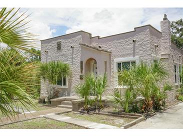 Spanish style home with stucco exterior, landscaping, and front porch at 1817 20Th S Ave, St Petersburg, FL 33712