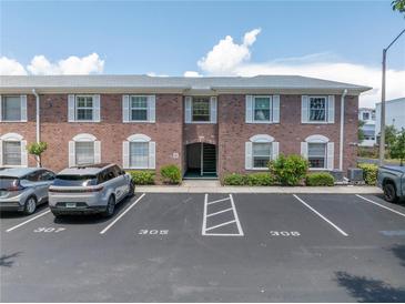 Brick building exterior with parking at 4115 34Th S Way # 195, St Petersburg, FL 33711