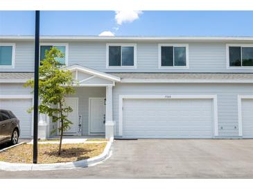 Front view of a two story house with attached garage at 7535 62Nd N Way, Pinellas Park, FL 33781