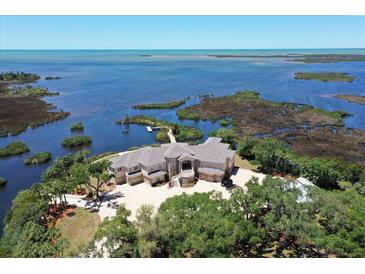 Waterfront mansion with expansive grounds at 1227 Osowaw Blvd, Spring Hill, FL 34607