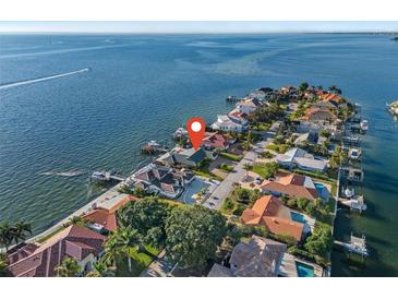 Aerial view of waterfront home with private dock and boat slips at 1948 Carolina Ne Ave, St Petersburg, FL 33703