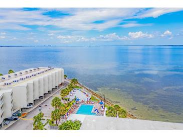 Inviting pool with scenic waterfront views at 2506 N Rocky Point Dr # 356, Tampa, FL 33607