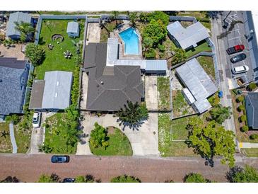 Aerial view of home, pool, and surrounding neighborhood at 4822 3Rd S Ave, St Petersburg, FL 33711