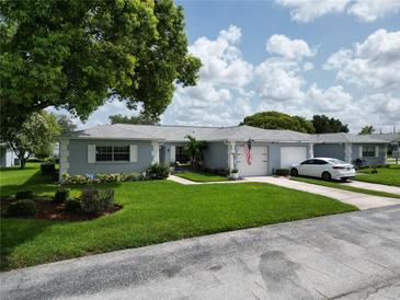 Charming light blue home with a spacious lawn at 8813 Spring Haven Blvd # 44, New Port Richey, FL 34655