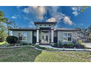 Photo one of 1298 Glowood Ave Spring Hill FL 34609 | MLS W7862902