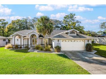 Photo one of 11242 Riddle Dr Spring Hill FL 34609 | MLS W7864432