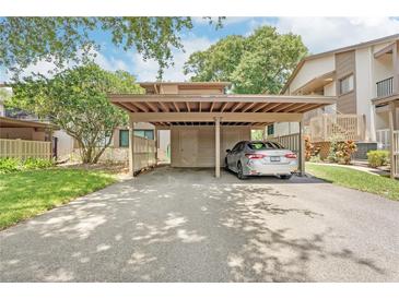 Covered carport parking for residents at 13002 Wedgewood Way # D, Hudson, FL 34667