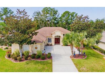 Single-Gathering home with landscaped yard at 5027 Gevalia Dr, Brooksville, FL 34604